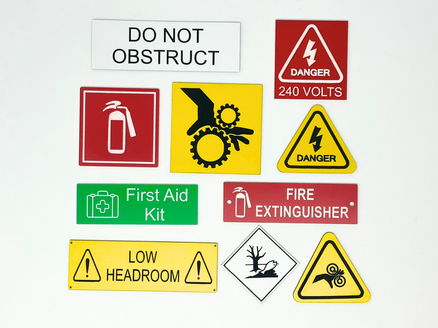 Engraved Traffolyte safety signs for marine and industrial equipment